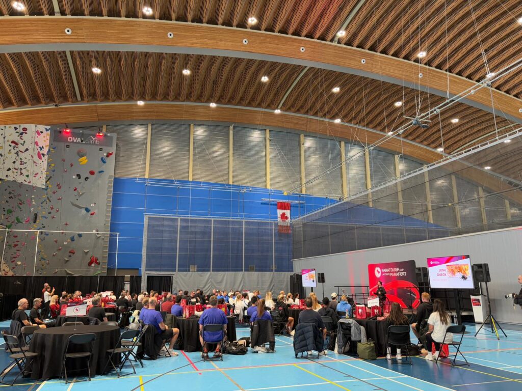 Image of people sitting and watching a presentation at the Richmond Olympic Oval.